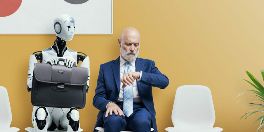 Man and AI robot waiting for a job interview: AI vs human competition